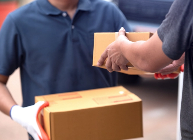 Delivery partner receiving package for delivery