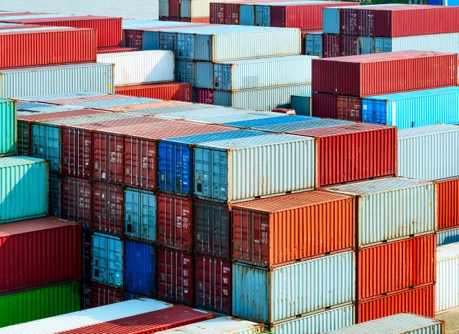 view of multiple storage containers in stock yard